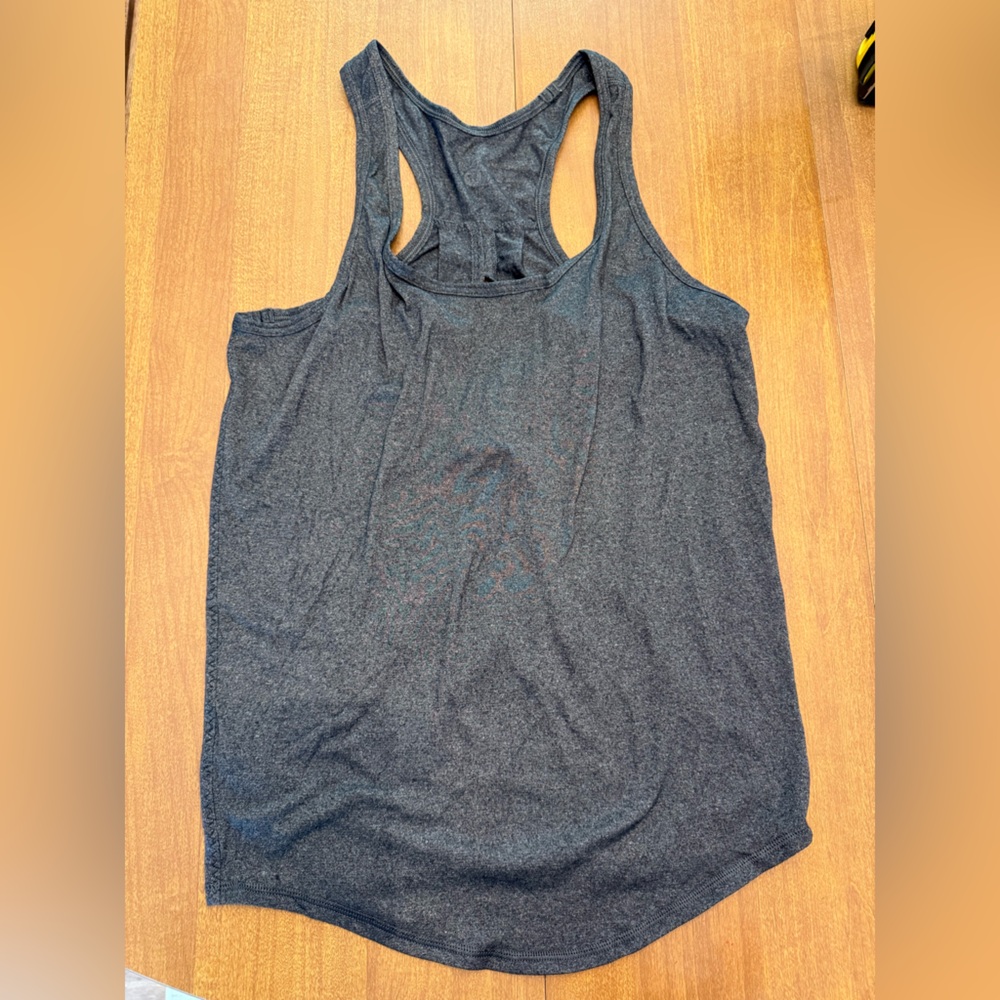 Lululemon workout top with open back.